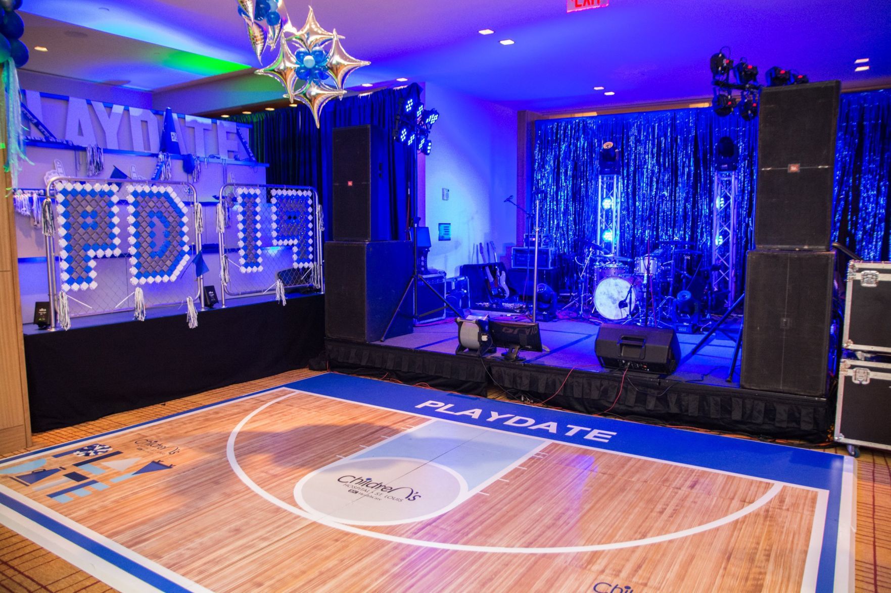 A high school themed basketball court dance floor
